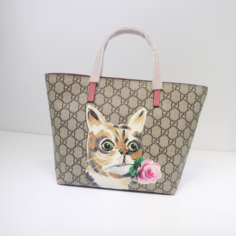 G*u*i shopping bags